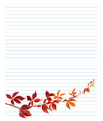 Image showing Red branch of grapes leaves on notebook paper