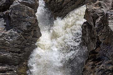 Image showing Waterfall Flowing Between the Lava Stones