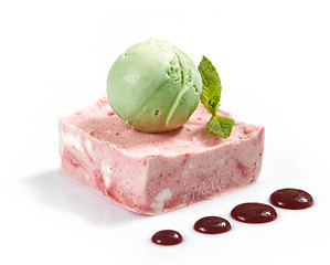 Image showing pink fruit cream with green icecream