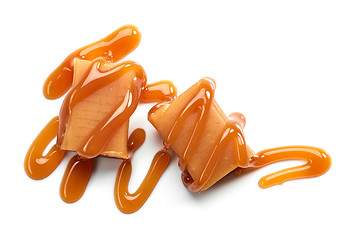 Image showing caramel candies on white background