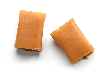Image showing caramel candies on white background