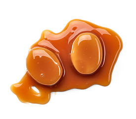 Image showing caramel candies on white background