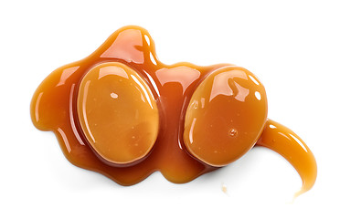 Image showing caramel candies and sweet sauce