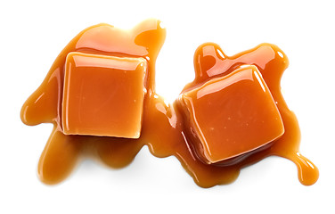 Image showing caramel candies and sauce