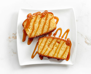 Image showing biscuit cake decorated with caramel sauce