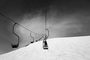 Image showing Black and white old chair-lift in ski resort