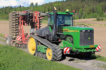 Image showing John Deere 9520T Agricultural Crawler Tractor and Cultivator