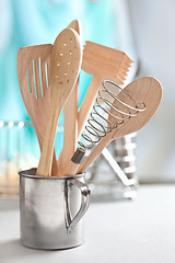 Image showing wooden kitchen utensils in cup