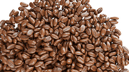 Image showing roasted coffee beans falling down isolated 