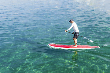 Image showing Senior man practicing paddle