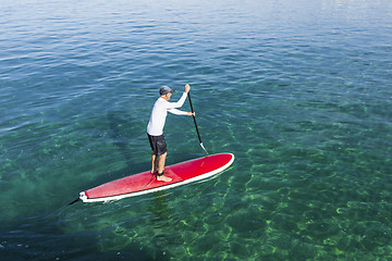 Image showing Senior man practicing paddle