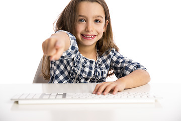 Image showing Little girl working with a computer