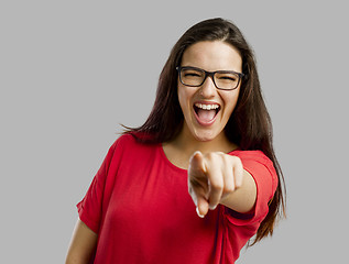 Image showing Happy woman pointing to the camera