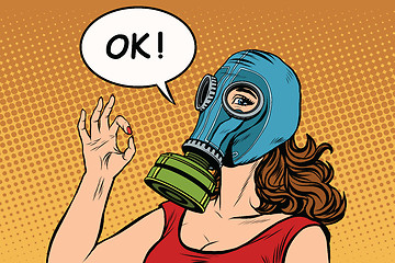 Image showing Young woman in gas mask okay gesture