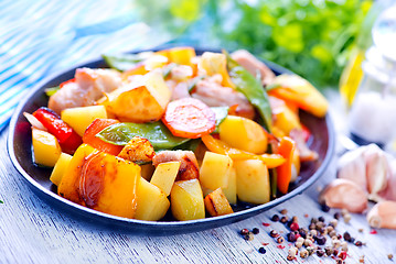 Image showing fried meat with vegetables