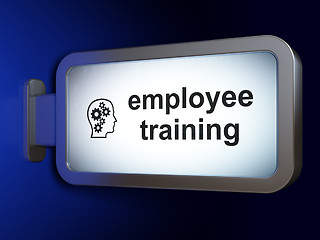 Image showing Learning concept: Employee Training and Head With Gears on billboard background