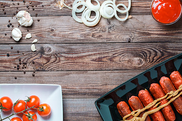 Image showing Sausage roasted on the grill.