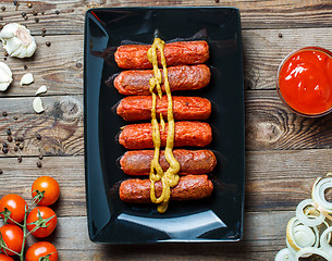 Image showing Sausage roasted on the grill.