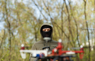 Image showing Man flying with the drone