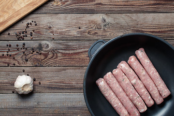 Image showing Raw Sausages in a Pan