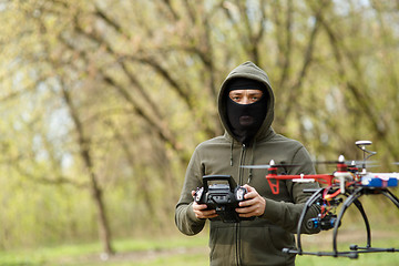 Image showing Man flying with the drone