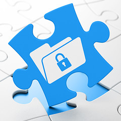 Image showing Finance concept: Folder With Lock on puzzle background