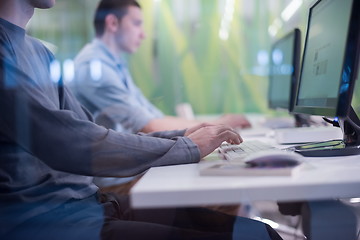 Image showing technology students group working  in computer lab school  class