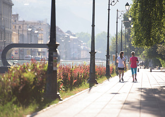 Image showing female friends jogging