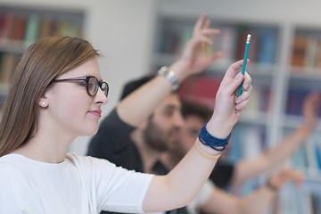 Image showing group of students  raise hands up