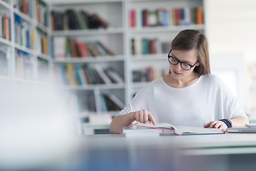 Image showing female student study in school library