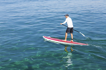 Image showing Senior man practicing paddle