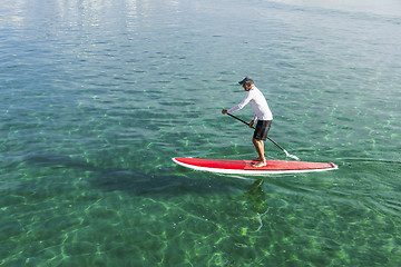 Image showing Senior man practicing paddle