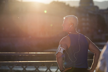 Image showing portrait of handsome senior jogging man