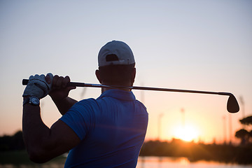 Image showing golfer hitting long shot