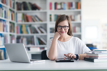 Image showing female student study in school library