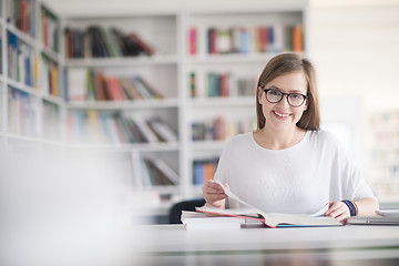 Image showing female student study in school library