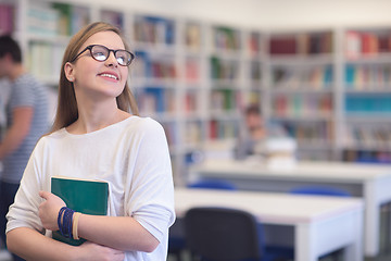 Image showing portrait of female student in library