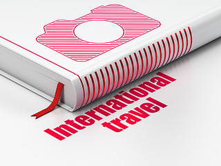 Image showing Tourism concept: book Photo Camera, International Travel on white background