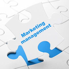 Image showing Advertising concept: Marketing Management on puzzle background