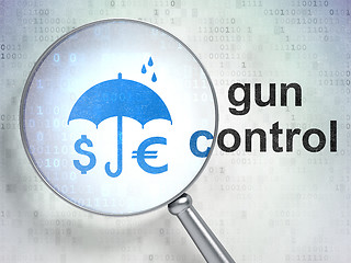 Image showing Protection concept: Money And Umbrella and Gun Control with optical glass