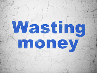 Image showing Banking concept: Wasting Money on wall background