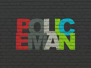 Image showing Law concept: Policeman on wall background