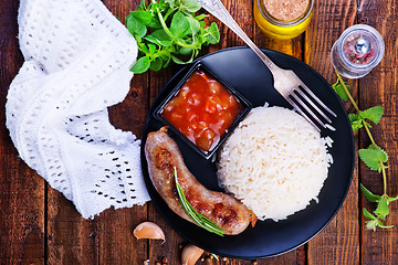 Image showing boiled rice with sausages