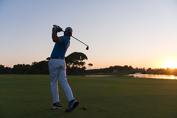 Image showing golfer hitting long shot