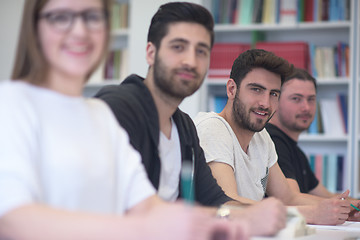 Image showing group of students study together in classroom