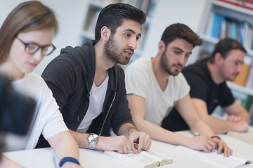 Image showing group of students study together in classroom