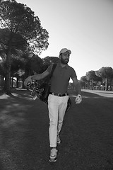 Image showing golf player walking