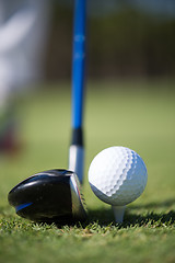 Image showing golf club and ball in grass