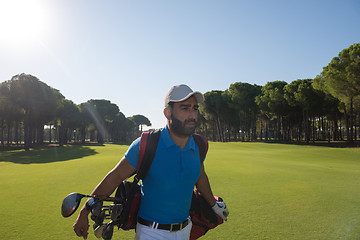 Image showing golf player walking