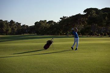 Image showing golfer hitting long shot